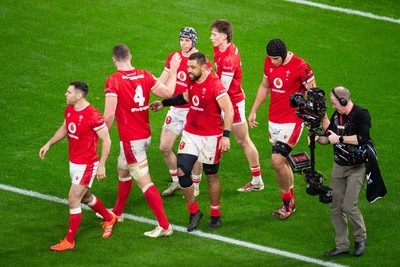 220225 - Wales v Ireland - Guinness Six Nations - Wales players celebrate the try by Tom Rogers of Wales in front of the tv cameras 