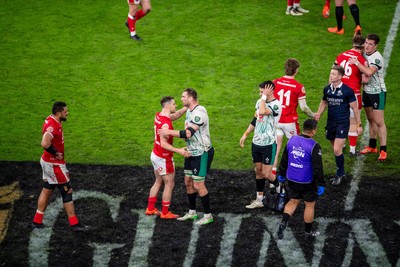 220225 - Wales v Ireland - Guinness Six Nations - Tomos Williams of Wales and Tadhg Beirne of Ireland