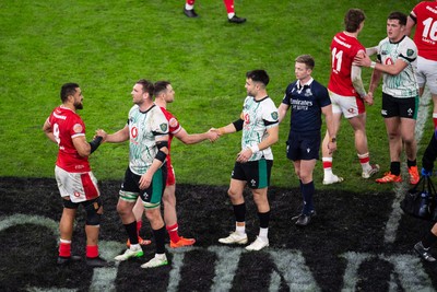 220225 - Wales v Ireland - Guinness Six Nations - Players shake hands at the end of the match