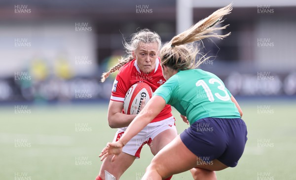 250323 - Wales v Ireland, TikToc Women’s 6 Nations - Hannah Jones of Wales takes on Aoife Dalton of Ireland