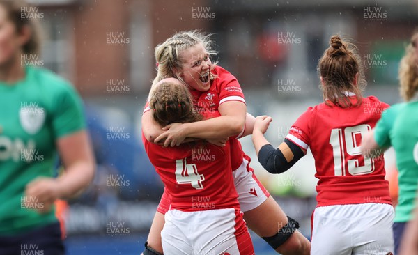 250323 - Wales v Ireland, TikToc Women’s 6 Nations - Alex Callender of Wales celebrates with Abbie Fleming of Wales on the final whistle