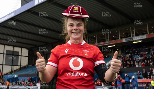 250323 - Wales v Ireland, TikToc Women’s 6 Nations - Kate Williams of Wales is presented with her Wales cap at the end of the match after making her debut