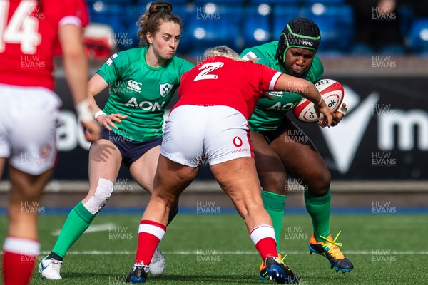 250323 - Wales v Ireland - TikTok Women's Six Nations - Linda Djougang  of Ireland is tackled by Kelsey Jones of Wales