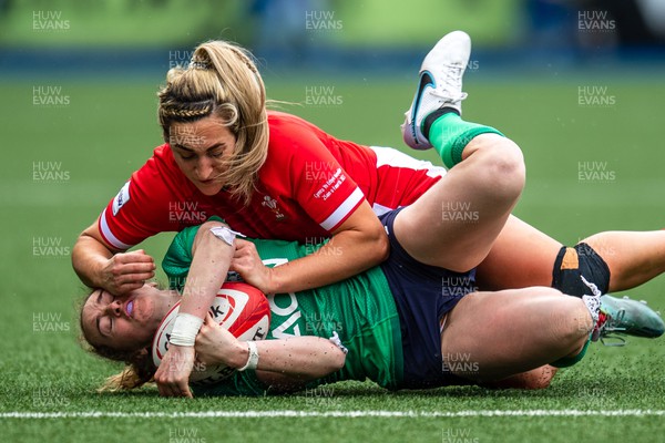 250323 - Wales v Ireland - TikTok Women's Six Nations - Molly Scuffil-McCabe  of Ireland is tackled by Courtney Keight of Wales