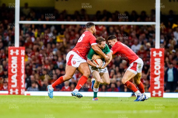 310819 - Wales v Ireland, Under Armour Summer Series - RWC Warmup - Jack Carty of Ireland fights through with the ball