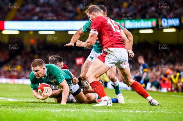 310819 - Wales v Ireland, Under Armour Summer Series - RWC Warmup - Andrew Conway of Ireland is tackled by Owen Lane of Wales 