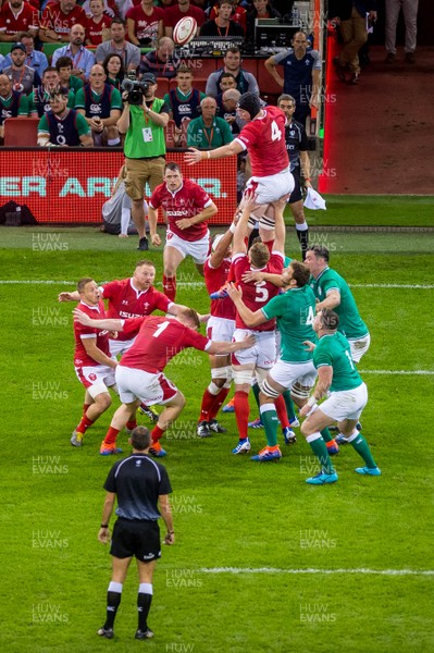 310819 - Wales v Ireland, Under Armour Summer Series - RWC Warmup - Adam Beard of Wales jumps for the ball 