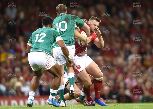 310819 - Wales v Ireland - Under Armour Series - Owen Lane of Wales is tackled by Jack Carty of Ireland