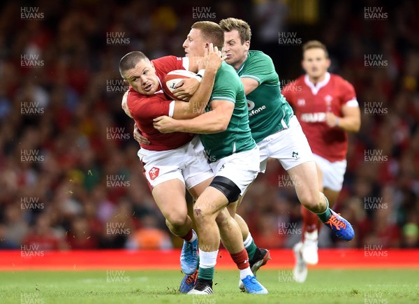 310819 - Wales v Ireland - Under Armour Series - Steff Evans of Wales is tackled by Andrew Conway of Ireland