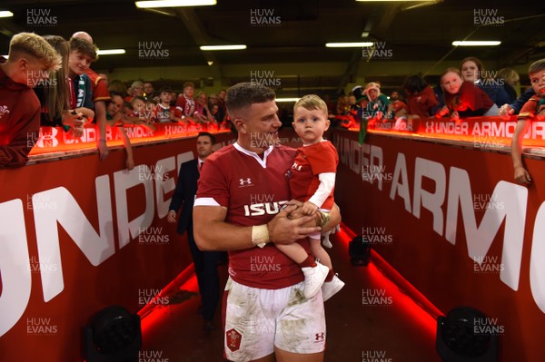 310819 - Wales v Ireland - Under Armour Series - Scott Williams of Wales with son Seb at the end of the game