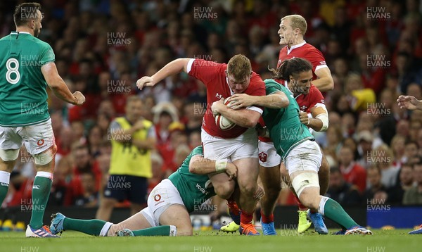 310819 - Wales v Ireland - Under Armour Summer Series - RWC Warm Up - Rhys Carre of Wales is tackled by Dave Kilcoyne and Peter O�Mahon of Ireland