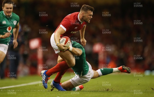 310819 - Wales v Ireland - Under Armour Summer Series - RWC Warm Up - Owen Lane of Wales is tackled by Will Addison of Ireland