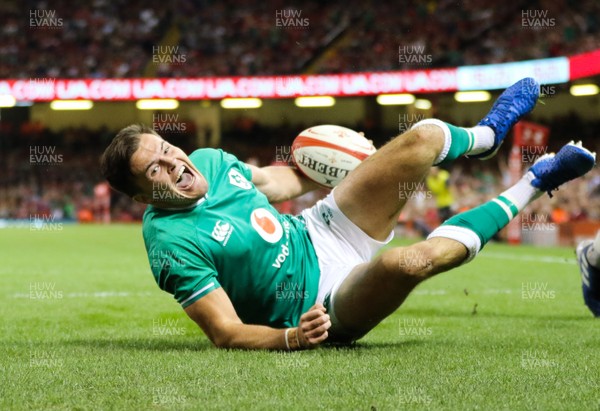 310819 - Wales v Ireland, Under Armour Summer Series 2019 - Jacon Stockade of Ireland dives in to score try