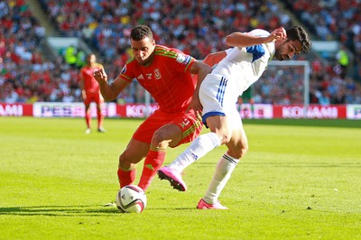 060915 - Wales v Israel - UEFA European Championship Qualifier - Hal Robson-Kanu of Wales is tackled by Omri Ben Harush of Israel