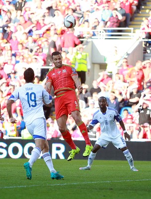 060915 - Wales v Israel - UEFA European Championship Qualifier - Hal Robson-Kanu of Wales headers the ball towards the goal