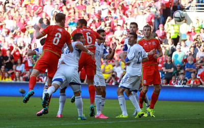 060915 - Wales v Israel - UEFA European Championship Qualifier - Andy King of Wales header almost goes past the goal line