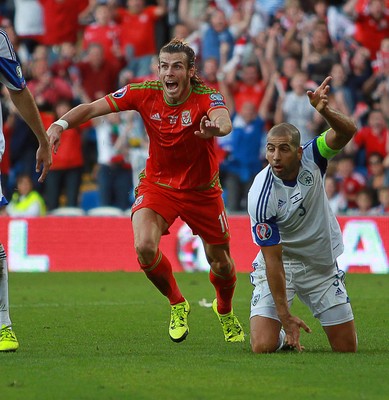 060915 - Wales v Israel - UEFA European Championship Qualifier - Gareth Bale of Wales celebrates prematurely as his last minute goal is disallowed
