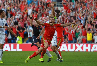 060915 - Wales v Israel - UEFA European Championship Qualifier - Gareth Bale of Wales celebrates prematurely as his last minute goal is disallowed