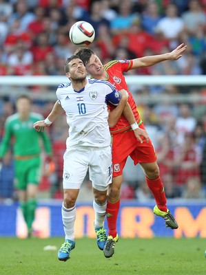 060915 - Wales v Israel, UEFA European Championship 2016 Qualifying match - Tomer Hemed of Israel and Ben Davies of Wales look to win the ball