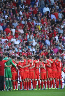 060915 - Wales v Israel, UEFA European Championship 2016 Qualifying match - The Welsh team line up for the national anthem