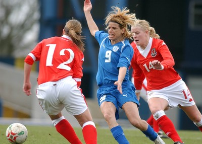300306 - Wales v Israel - FIFA Women's World Cup - Euro Group 8 Israel's Silvi Jen takes on Katie Williams(12) and Kerrie Manley 