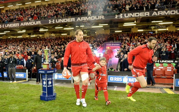 010214 - Wales v Italy - RBS Six Nations 2014 -Alun Wyn Jones of Wales leads out his side with mascot Rhys John Davies