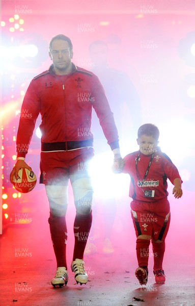 010214 - Wales v Italy - RBS Six Nations 2014 -Alun Wyn Jones of Wales leads out his side with mascot Rhys John Davies