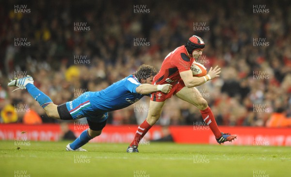 010214 Wales v ItalyWales' Leigh Halfpenny is tackled by Mauro Bergamasco of Italy(c) Huw Evans, Cardiff