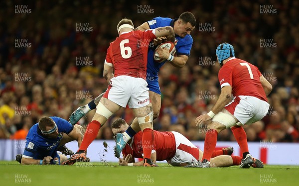 010220 - Wales v Italy - Guinness 6 Nations - Andrea Lovotti of Italy is tackled by Aaron Wainwright of Wales