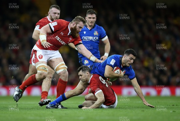 010220 - Wales v Italy - Guinness 6 Nations - Leonardo Sarto of Italy is tackled by Tomos Williams of Wales