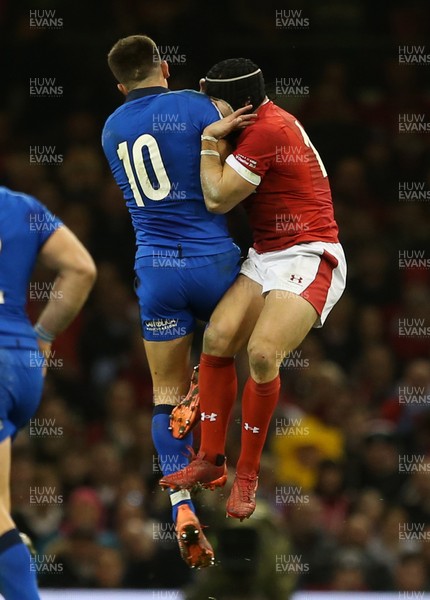 010220 - Wales v Italy - Guinness 6 Nations - Tommaso Allan of Italy and Leigh Halfpenny of Wales collide in the air