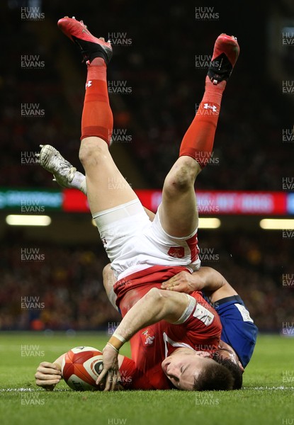 010220 - Wales v Italy - Guinness 6 Nations - Josh Adams of Wales is upside down as he scores a try at the end of the game