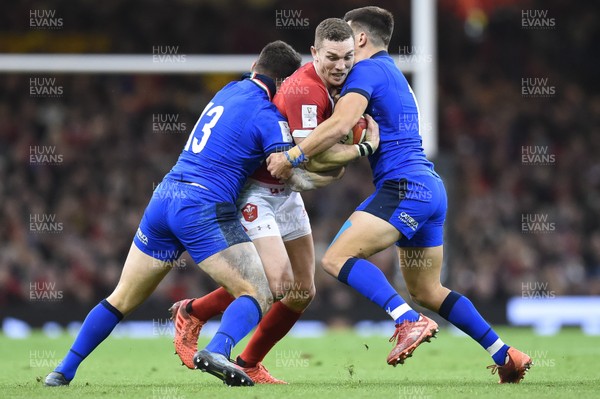 010220 - Wales v Italy - Guinness Six Nations - George North of Wales is tackled by Luca Morisi and Tommaso Allan of Italy 