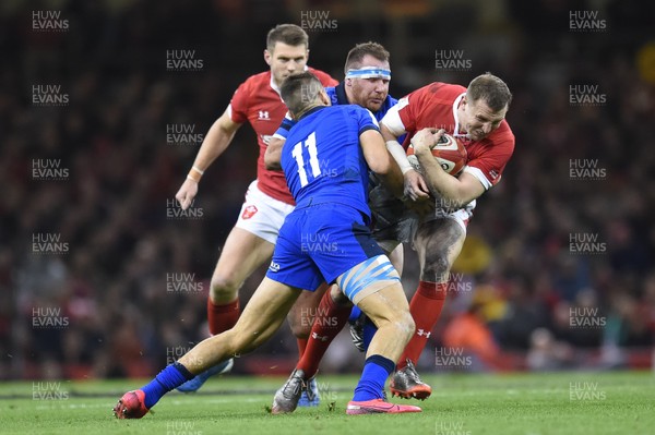 010220 - Wales v Italy - Guinness Six Nations - Hadleigh Parkes of Wales is tackled by Mattia Bellini of Italy