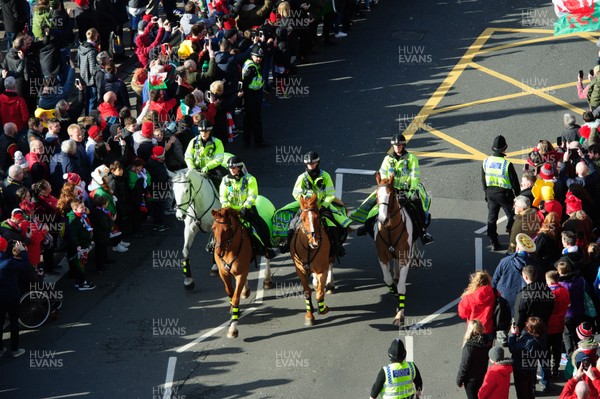 010220 - Wales v Italy - Guinness Six Nations - Mounted Police officers escort the Wales team bus along Westgate Street, Cardiff 