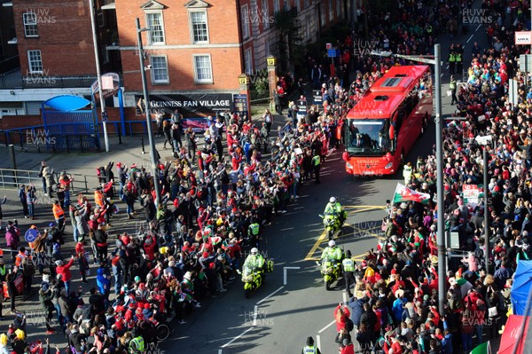 010220 - Wales v Italy - Guinness Six Nations - Police officers escort the Wales team bus along Westgate Street, Cardiff 
