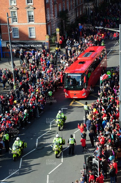 010220 - Wales v Italy - Guinness Six Nations - Police officers escort the Wales team bus along Westgate Street, Cardiff 