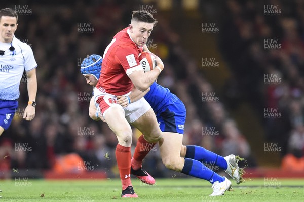 010220 - Wales v Italy - Guinness Six Nations - Josh Adams of Wales is tackled by Luca Bigi (c) of Italy  