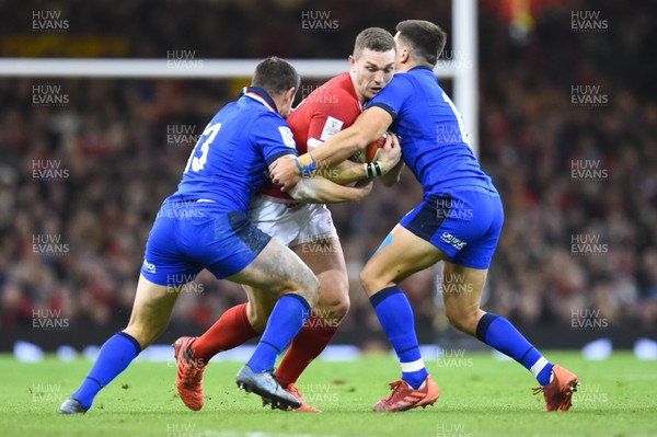 010220 - Wales v Italy - Guinness Six Nations - George North of Wales is tackled by Luca Morisi of Italy  and Tommaso Allan of Italy  