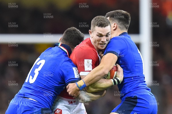 010220 - Wales v Italy - Guinness Six Nations - George North of Wales is tackled by Luca Morisi of Italy  and Tommaso Allan of Italy  