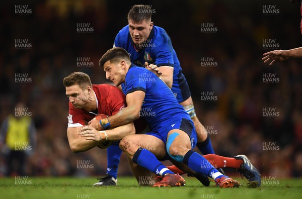 010220 - Wales v Italy - Guinness Six Nations - Dan Biggar of Wales is tackled by Tommaso Allan of Italy