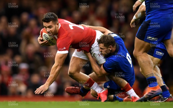 010220 - Wales v Italy - Guinness Six Nations - Rhys Webb of Wales is tackled by Callum Braley of Italy