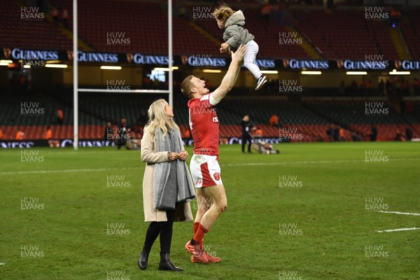 010220 - Wales v Italy - Guinness Six Nations - Johnny McNicholl with his partner Grace with daughter August at the end of the game