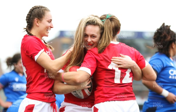 020220 - Wales v Italy, 2020 Women's Six Nations - Hannah Jones of Wales celebrates with Jasmine Joyce of Wales and Kerin Lake of Wales after scoring try