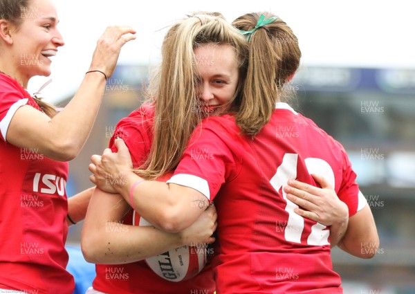 020220 - Wales v Italy, 2020 Women's Six Nations - Hannah Jones of Wales celebrates with Jasmine Joyce of Wales and Kerin Lake of Wales after scoring try