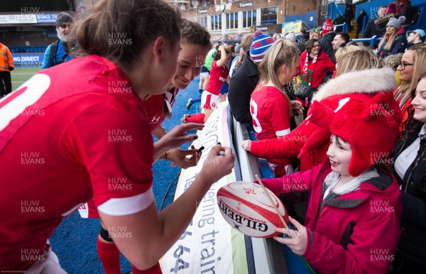020220 - Wales v Italy, 2020 Women's Six Nations - Jasmine Joyce of Wales and Robyn Wilkins of Wales sign autographs at the end of the match