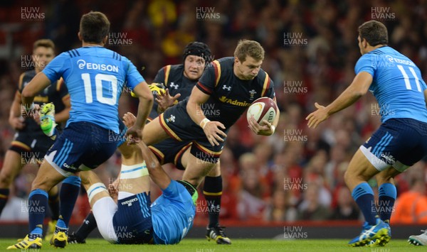 050915 -  Wales v Italy - Dove Men Test 2015 -Dan Biggar of Wales is tackled by Francesco Minto of Italy