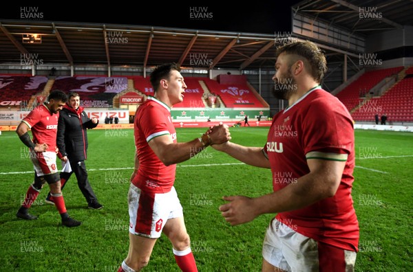 051220 - Wales v Italy - Autumn Nations Cup - Josh Adams and Tomas Francis of Wales at the end of the game