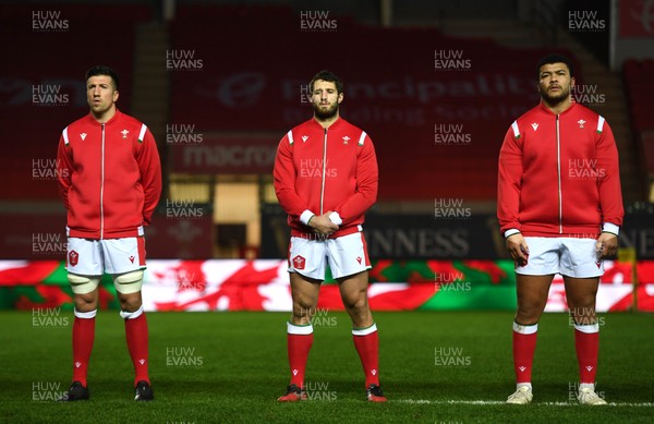 051220 - Wales v Italy - Autumn Nations Cup - Justin Tipuric, Jonah Holmes and Leon Brown of Wales during the anthems 