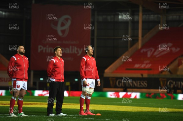 051220 - Wales v Italy - Autumn Nations Cup - Sam Parry, Jonathan Davies and Alun Wyn Jones of Wales during the anthems 